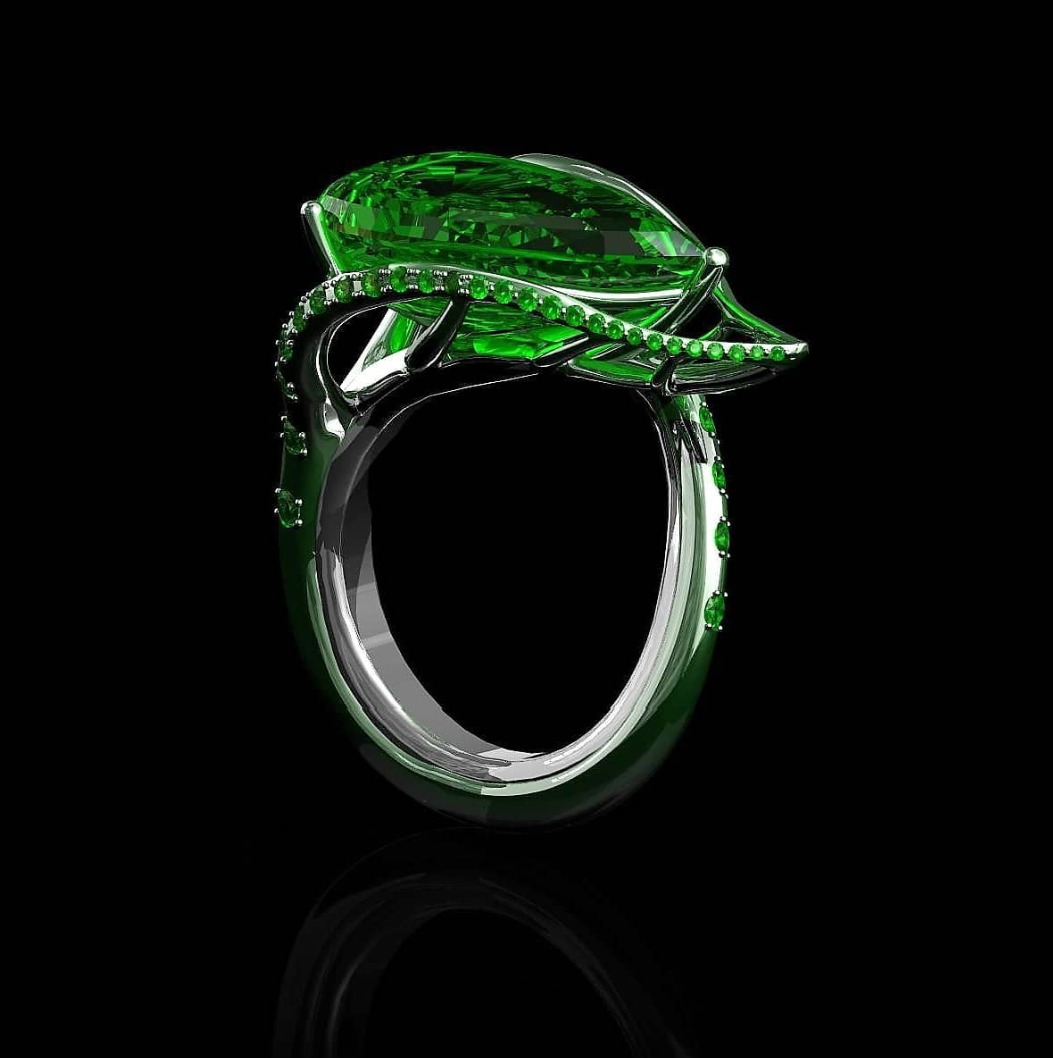 Bague feuille émeraude en titane coloré, création haute joaillerie Genève